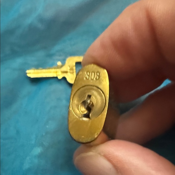 Louis Vuitton gold-tone brass padlock and key set #303